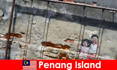 El fascinante y diverso arte callejero en la isla de Penang asombra a extraños