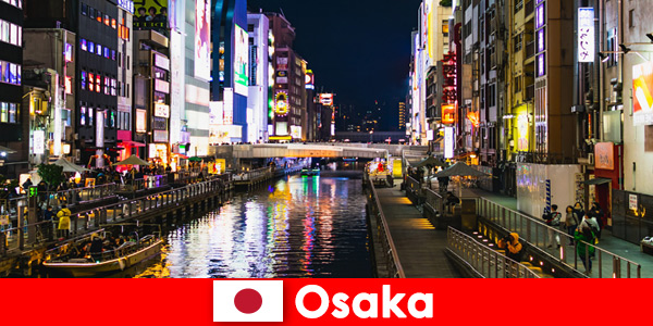 Distritos de entretenimiento y delicias esperan a los viajeros extranjeros en Osaka, Japón
