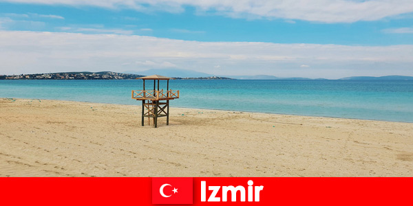 Los vacacionistas relajantes estarán encantados con las playas de Izmir, Turquía